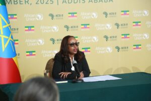 alt="Dr. Fitsum Assefa speaks at Africa Climate Summit press conference"